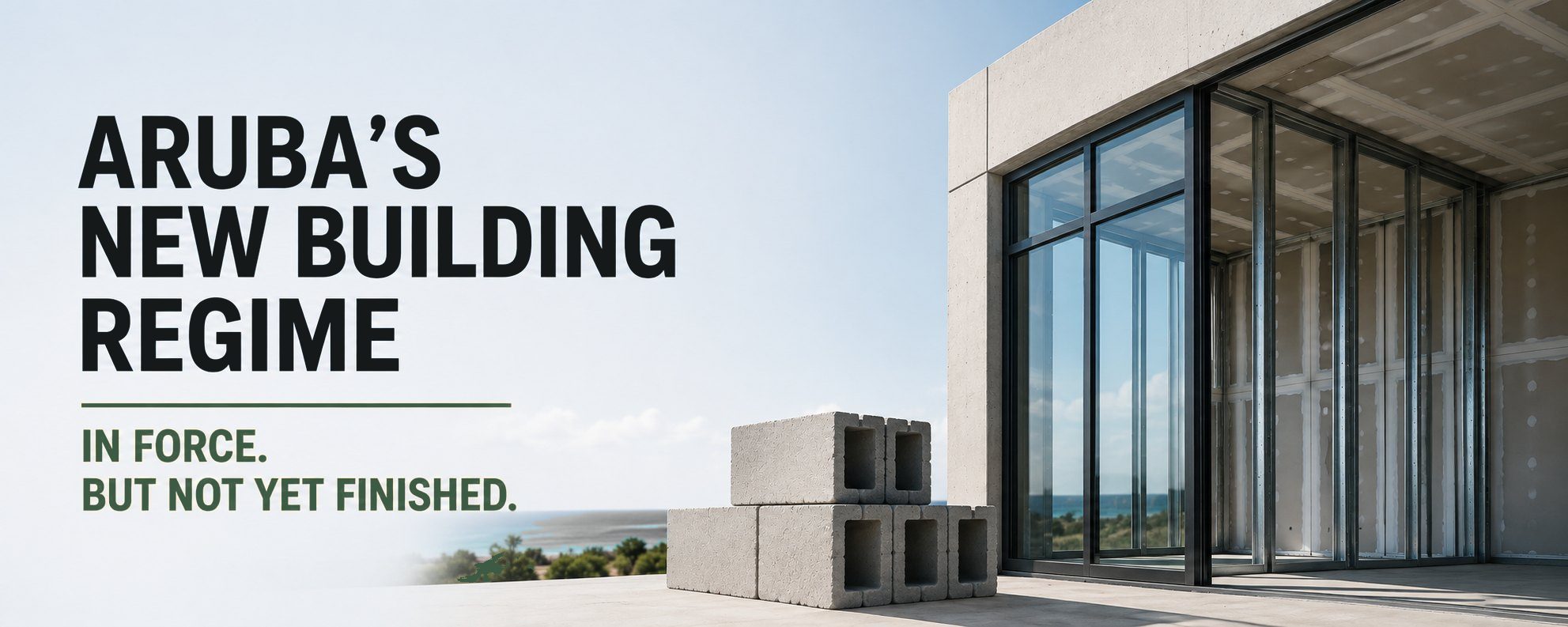 A modern concrete-and-glass building under construction on an Aruban clifftop above the sea, with a stack of grey cinder blocks in the foreground. Set into the sky at left, the title Aruba's New Building Regime, and beneath a gold rule the words In Force. But Not Yet Finished.