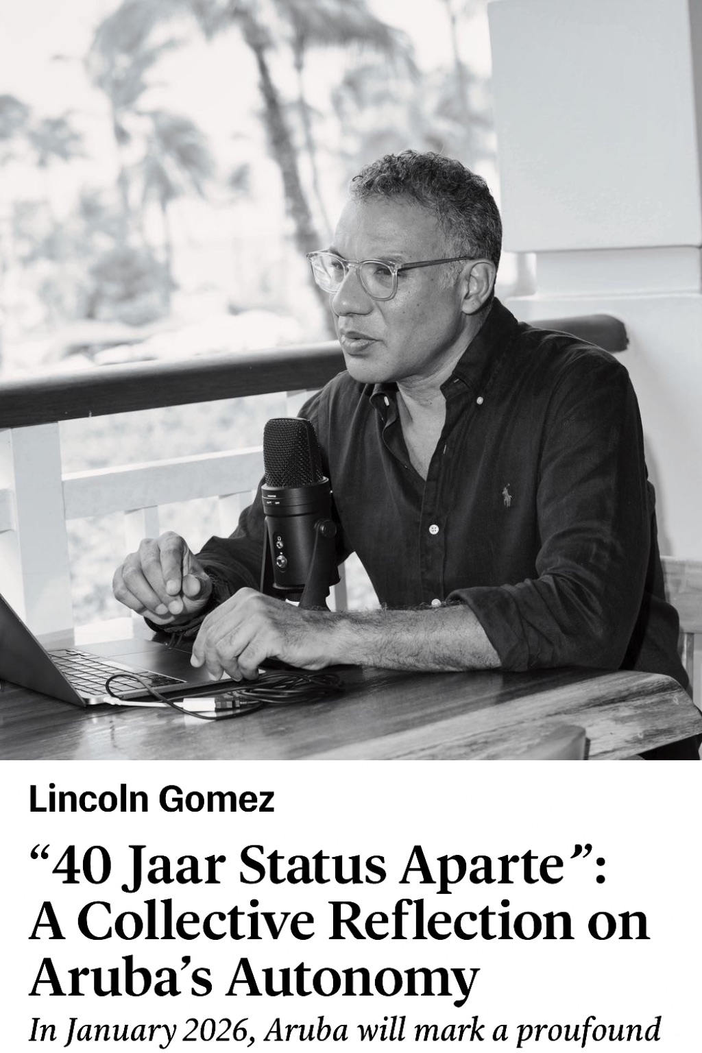 Article opening with a photograph of the author speaking into a desk microphone at a laptop